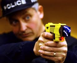 officer with taser