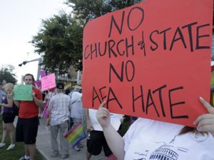 opponents-of-the-response-protest-the-american-family-association-the-conservative-organization-that-paid-for-the-rally